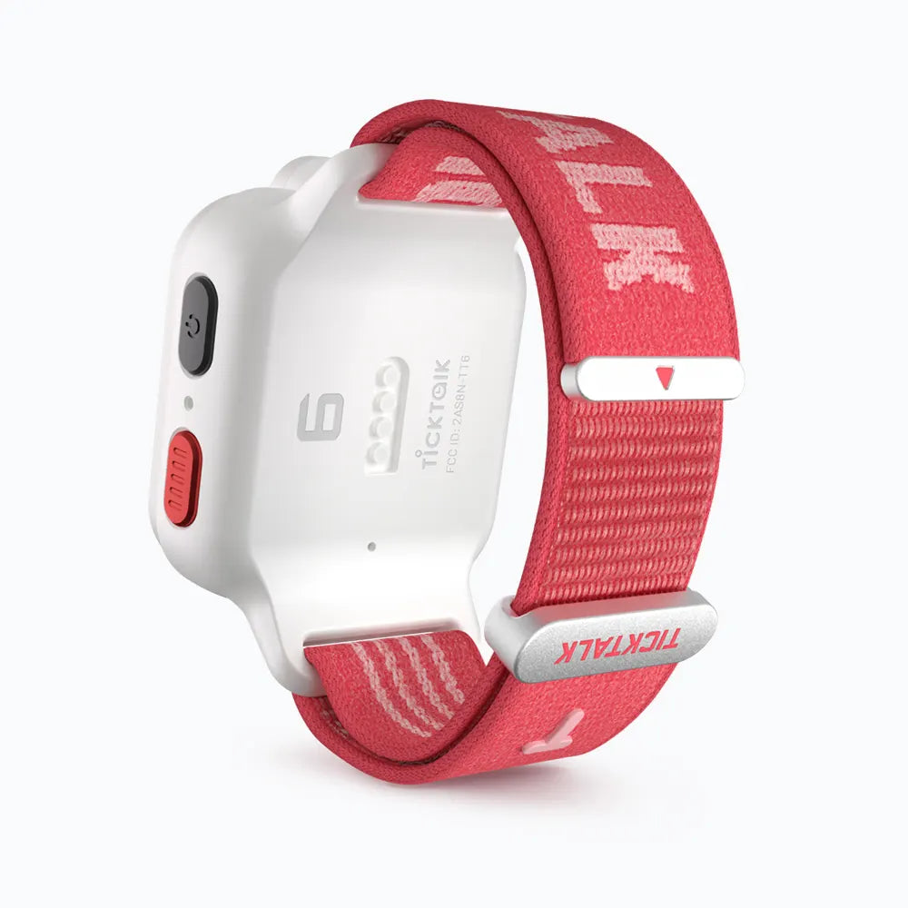 Coral Pink TickTalk 6 replacement wristband on a white smartwatch, rear view. 