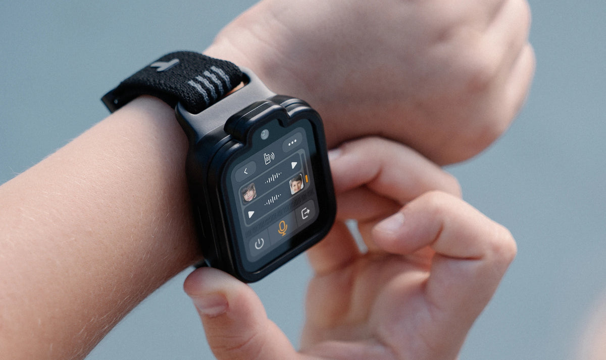 Child using the TickTalkie screen on a black TickTalk 6 smartwatch